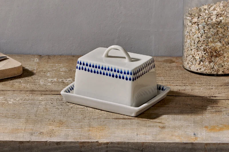 Art Deco Ceiling Lights with Geometric Patterns and Metallic FinishesIndigo Drop Butter Dish - Cream & Indigo