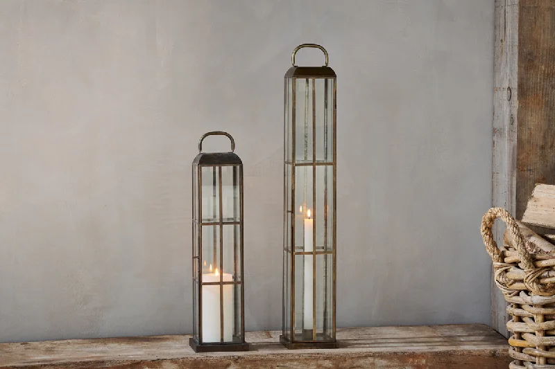 Industrial Style Ceiling Lights with Exposed Bulbs and Metal CagesVemula Lantern - Antique Brass